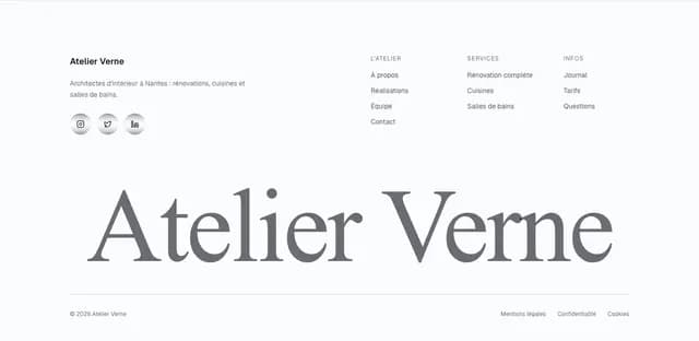 The library block "Footer with a giant name", with its demo copy.
